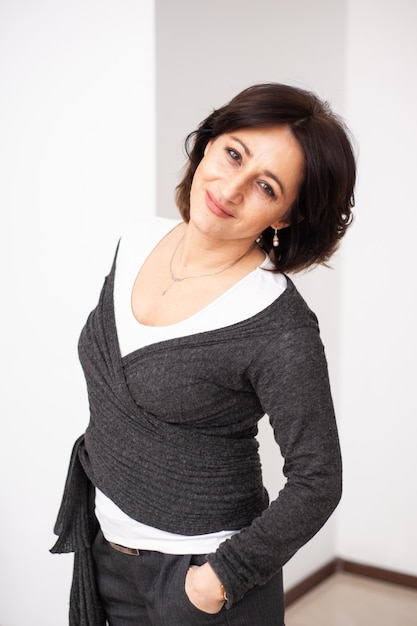 Happy businesswoman on white background