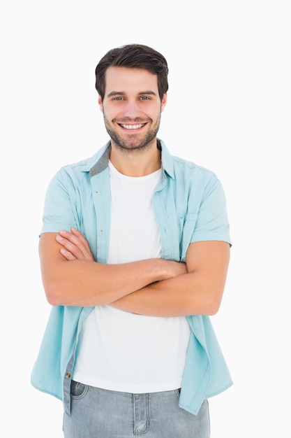 Happy casual man smiling at camera