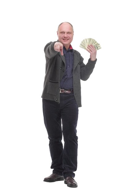 Happy casual man with dollar bills isolated on a white background