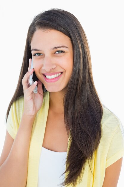 Happy casual woman on the phone