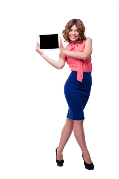 Happy casual woman showing tablet computer screen