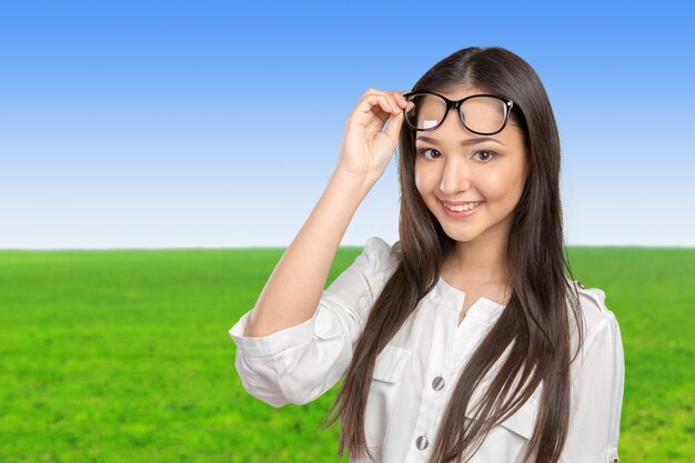 Happy casual young woman in glasses