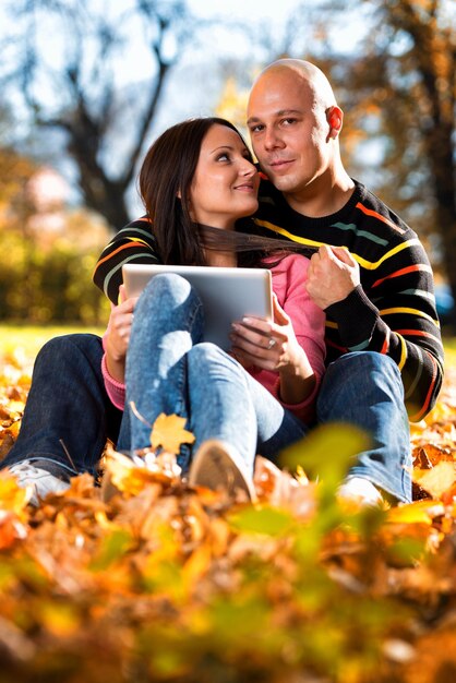 Happy Caucasian Couple With A Digital Tablet