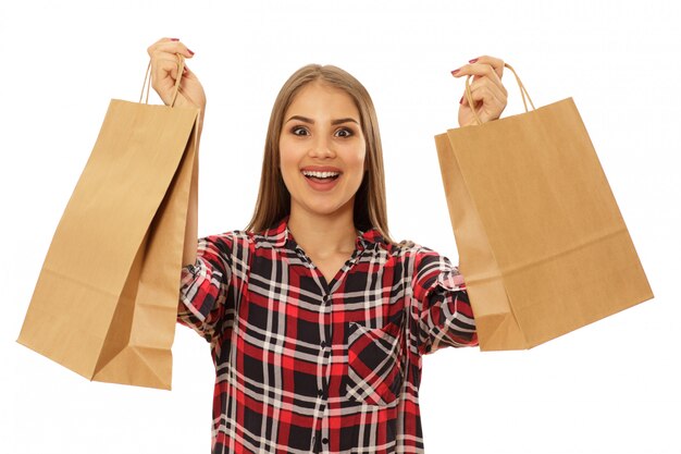 Happy charming woman with shopping bags