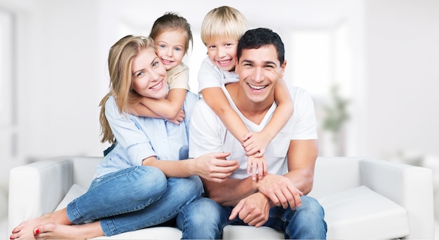 Happy cheerful family on background