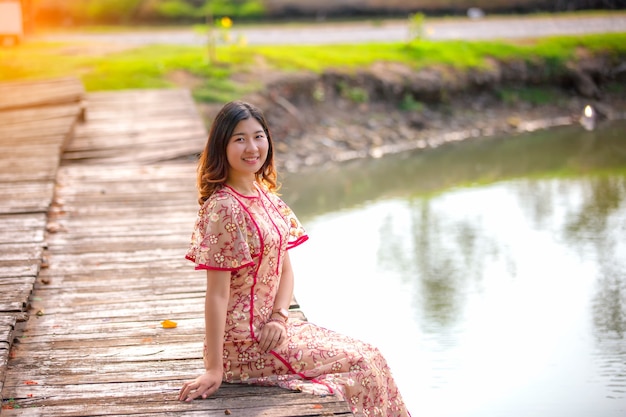 Happy cheerful of young Asian woman looking at the camera.