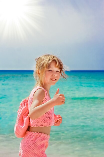 Happy child on the beach in the nature of cyprus