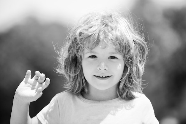 Happy child boy portrait Kids emotions Kid outdoor