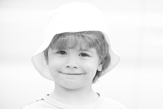 Happy child in hat International childrens day Closeup portrait of a happy boy Little boy enjoy life Happy childhood Positive child Closeup of cute young boy