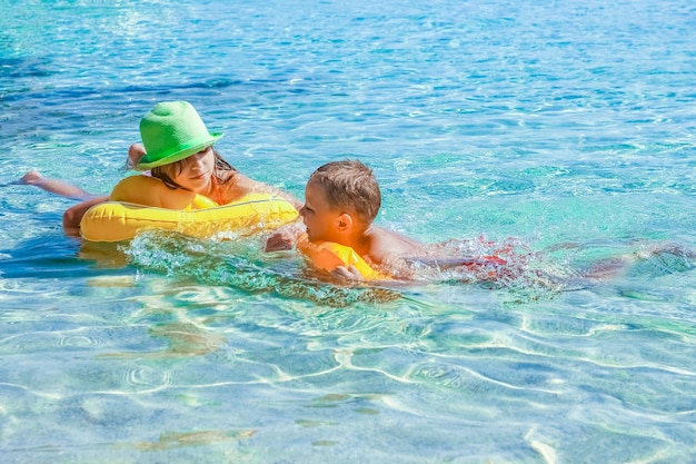 Happy child playing by the sea