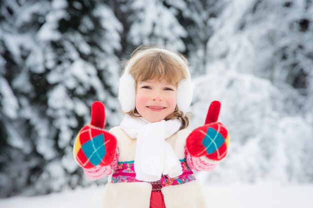 Happy child playing outdoors