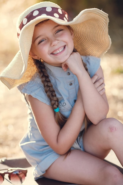 happy child traveller with map and camera