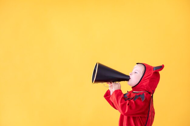 Photo happy child wearing halloween costume