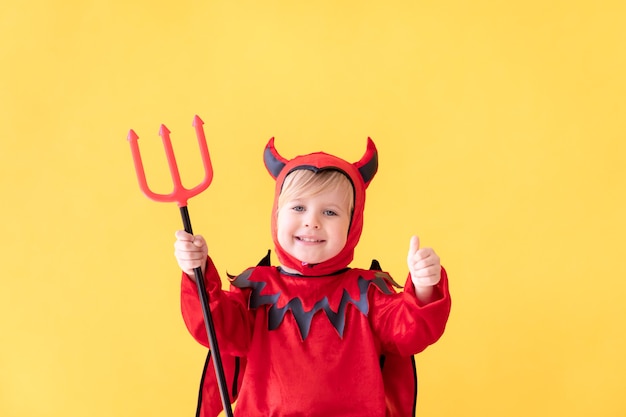 Happy child wearing Halloween costume