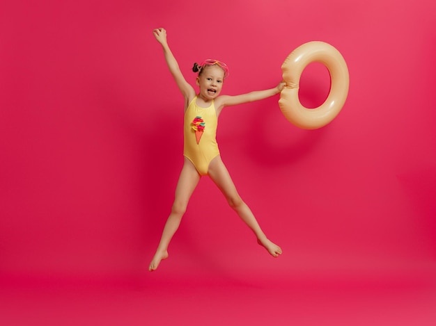 Happy child wearing swimsuit