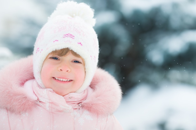 Happy child in winter park