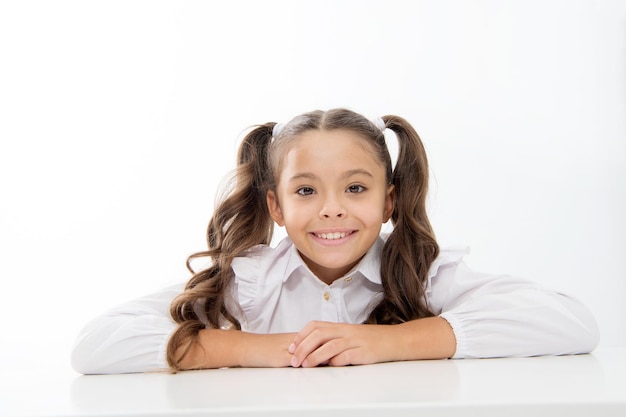 Happy childhood. happy childhood of school girl isolated on white.