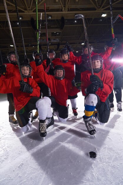 Happy children group  ice hockey team  sport players portrait