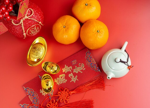 Happy Chinese New Year with Mandarin Oranges Chinese Sentences respectively means good luck.