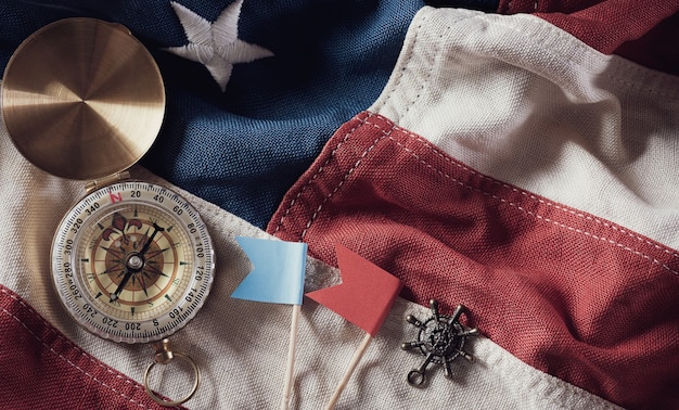 Photo happy columbus day concept. vintage american flag with compass