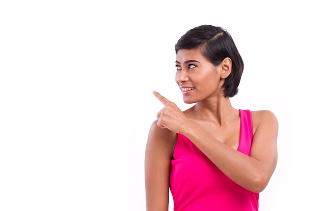 Happy, confident woman pointing up