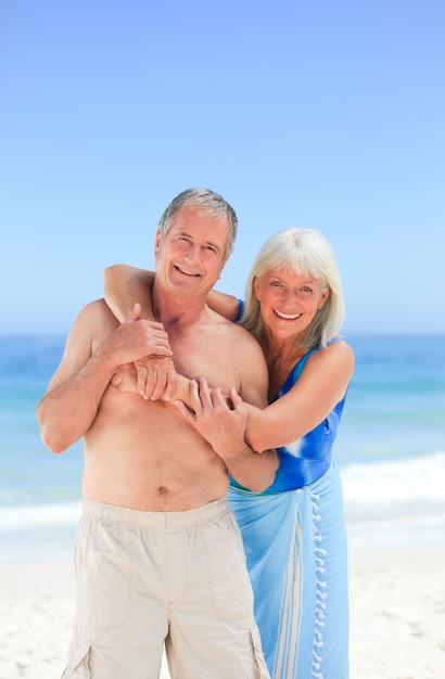 Happy couple on the beach