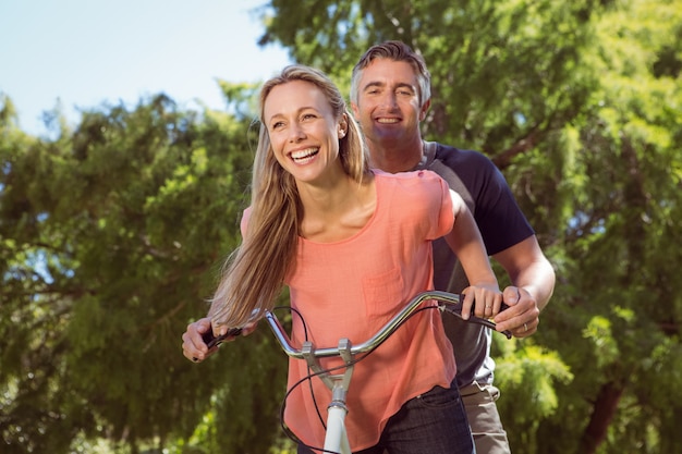 Happy couple on a bike ride