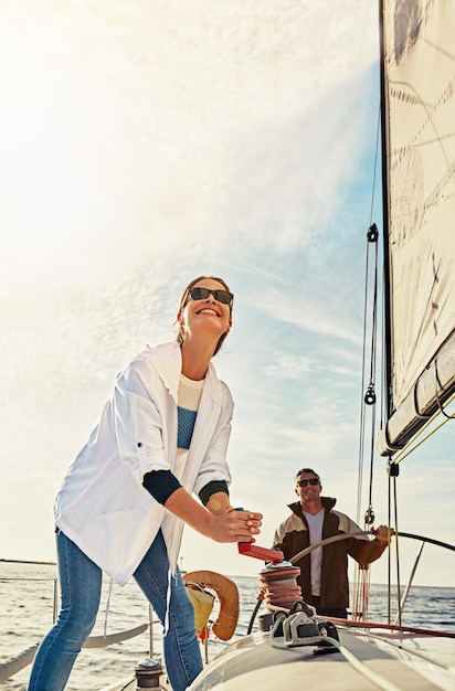 Happy couple boat and steering helm in sea travel holiday investment and retirement wealth hobby Rich fun and sailing of mature people on ocean or lake water for outdoor adventure and activity