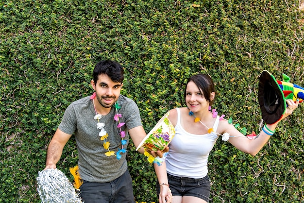 Happy couple at a Brazilian carnival party