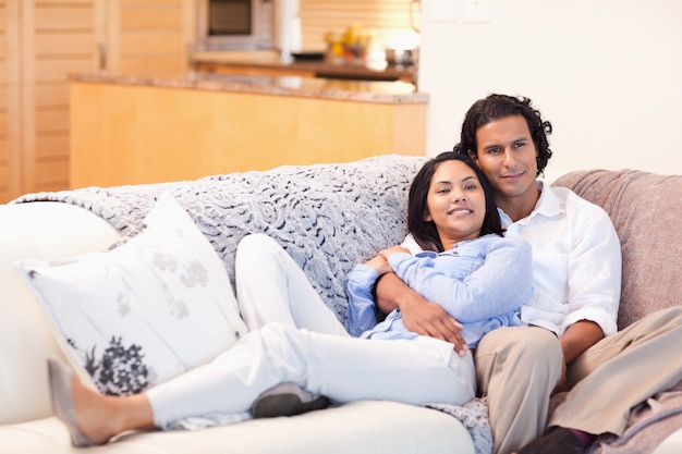 Happy couple on the couch together