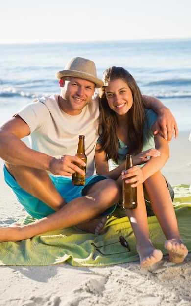 Happy couple drinking together