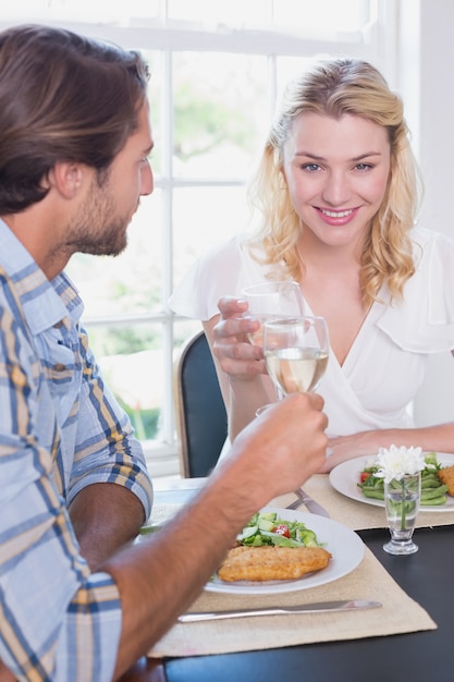 Happy couple enjoying a meal together