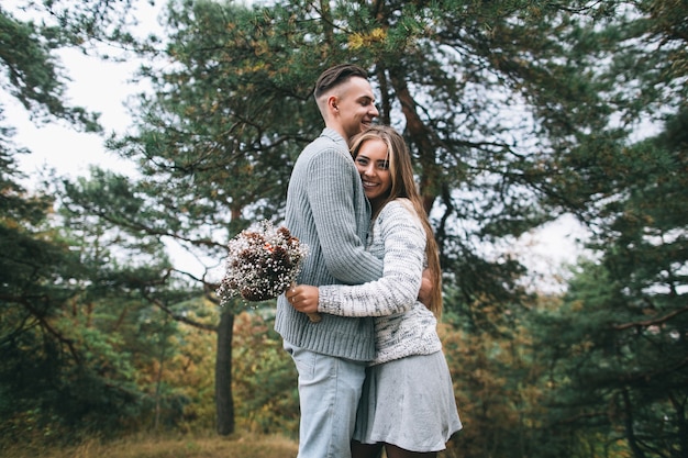 happy couple in a forest