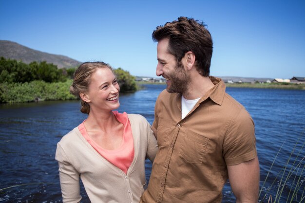 Happy couple at a lake