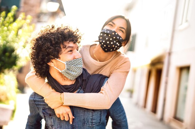 Happy couple of lovers enjoying winter travel time outdoor