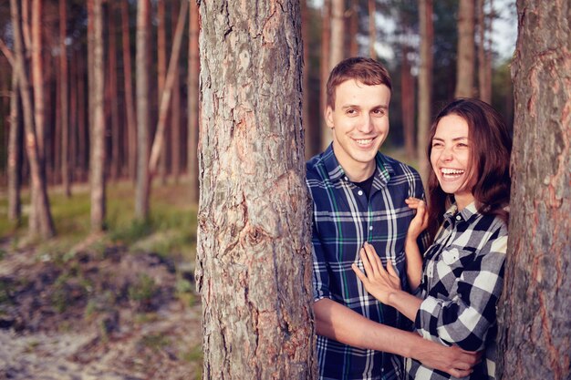 Happy couple Loving couple enjoying in moments of happiness in the park Love and tenderness dating romance