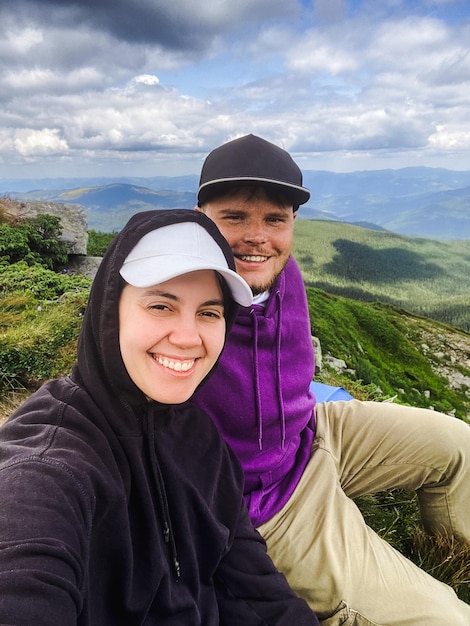 A happy couple on the mountain