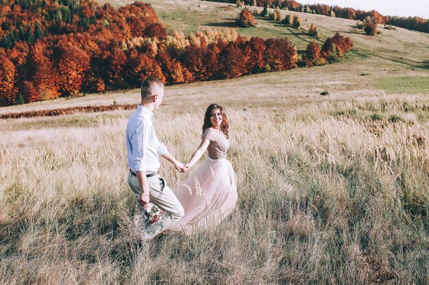 Happy couple outdoor on mountains