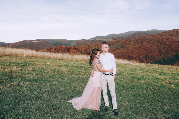 Happy couple outdoor on mountains