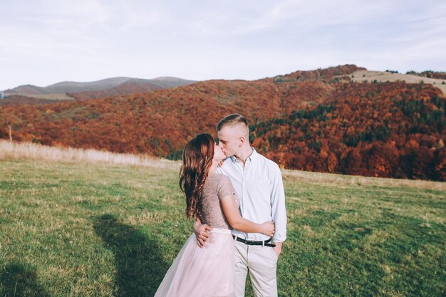 Happy couple outdoor on mountains