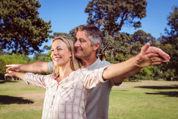 Happy couple in the park on a sunny day