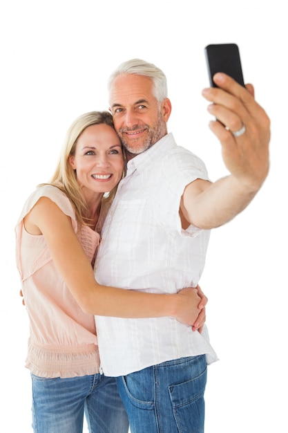 Happy couple posing for a selfie