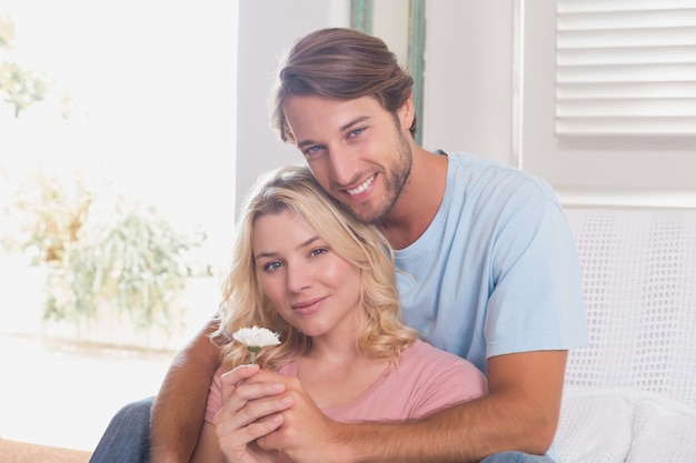 Happy couple relaxing on the couch