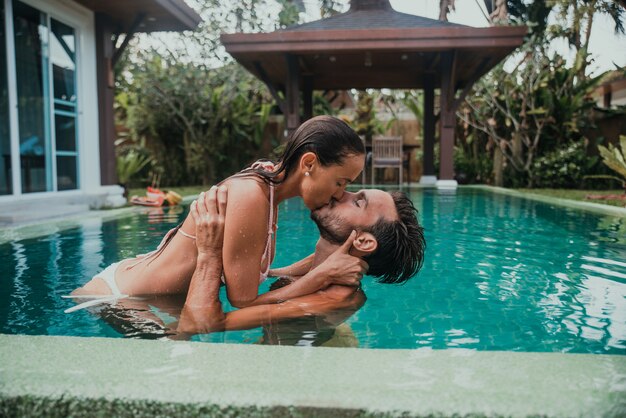 Happy couple spending time in a beautiful vacation house