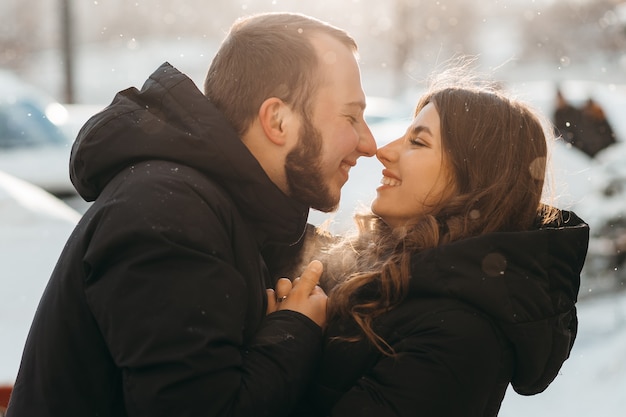 Happy couple touching each other and smiling cute