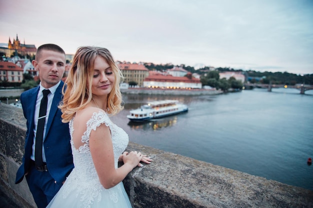 Happy couple walking in night city