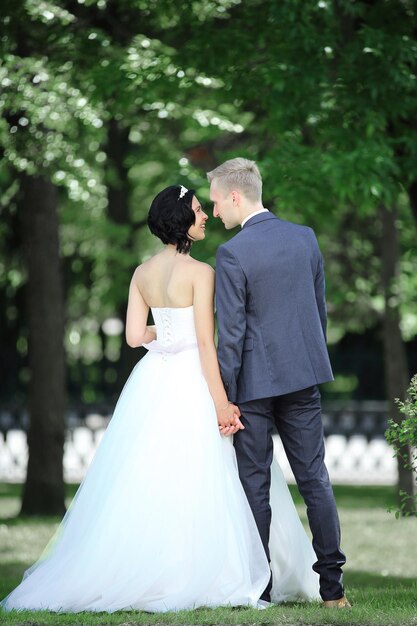 Happy couple walking in the Park on a Sunny day