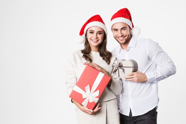 Happy couple with gift boxes