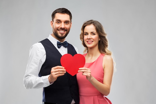 happy couple with red heart on valentines day