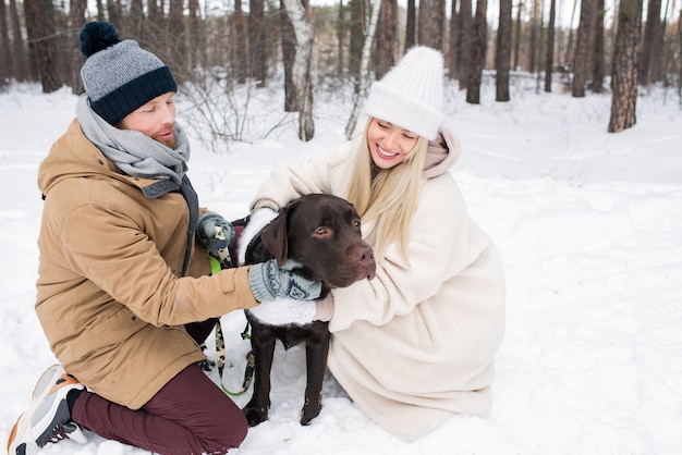 Happy Couple With Their Dog